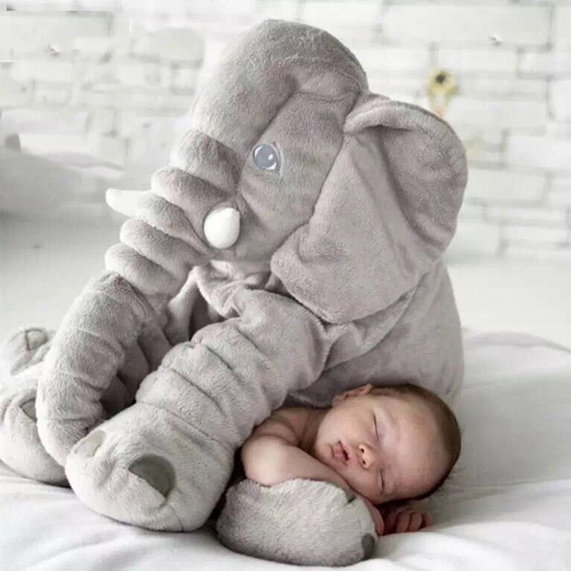 baby sleeping with stuffed animal